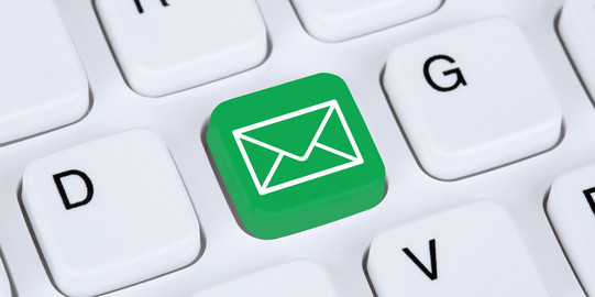 email Close-up of a white keyboard. Between D and G is a green key with an envelope on it